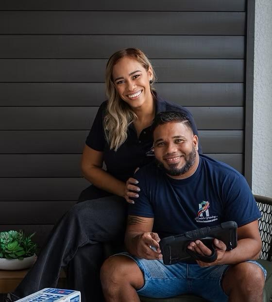 Hamlet Vasquez, owner of Hamlet's Painting & Renovations, with his wife Iris