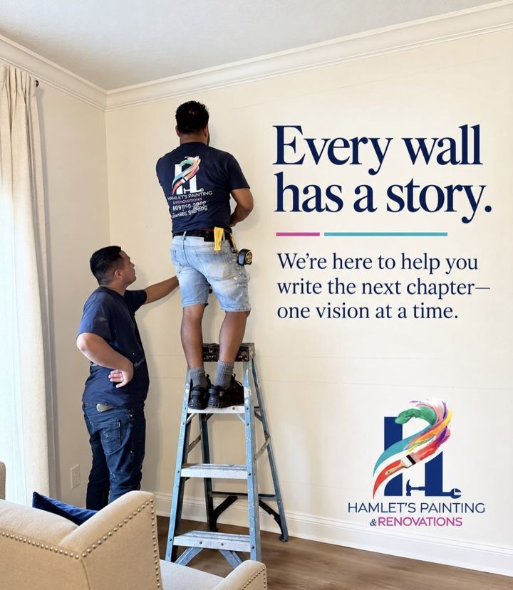 Hamlet's Painting crew at work on a living room wall